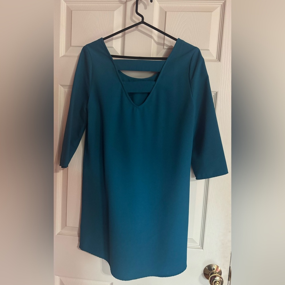 Blue tunic/mini dress with 3/4 sleeves & back cutout size medium from Le Tote